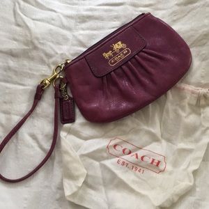 plum purple Coach wristlet